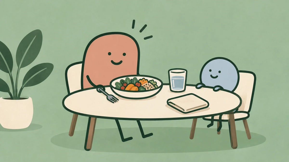 Terracotta character sitting at a meal with its fork resting beside the bowl and a blue companion across the table.